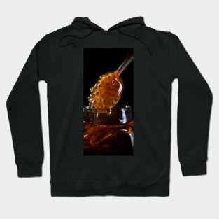 Delicious seduction: macro shot of fresh honey Hoodie